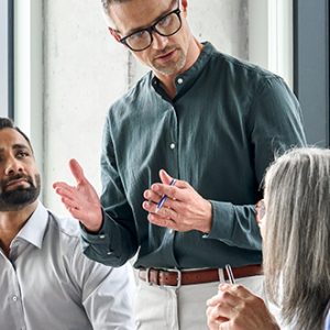 Mitigating-Impact-SubscriptionBilling office workers talking
