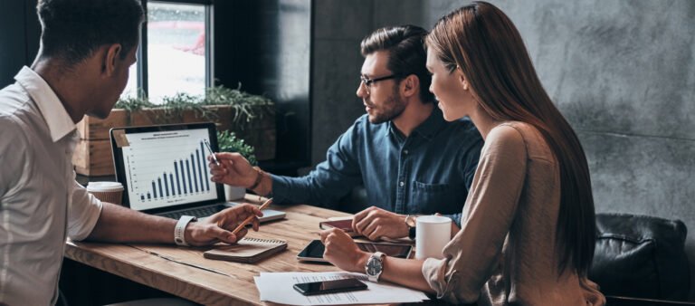 Business Professionals Group Of Young Confident Business People Analyzing Data