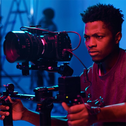 young person with camera