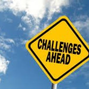 Challenges ahead road sign